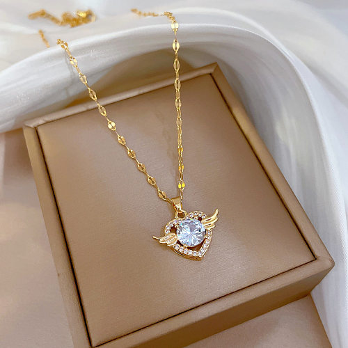 Collar con colgante de diamantes de imitación con incrustaciones de cobre y acero inoxidable en forma de corazón de estilo simple