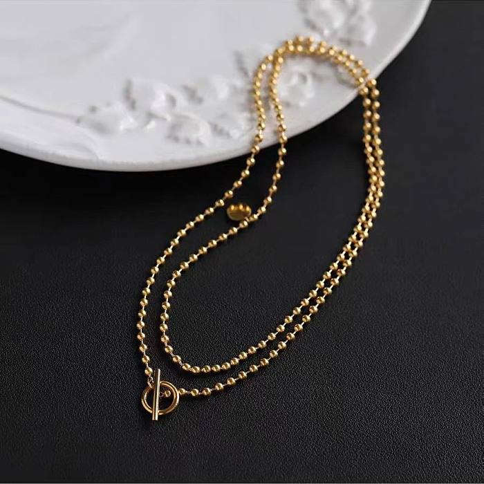 Collares de doble capa chapados en oro geométricos de acero inoxidable 18K de estilo simple