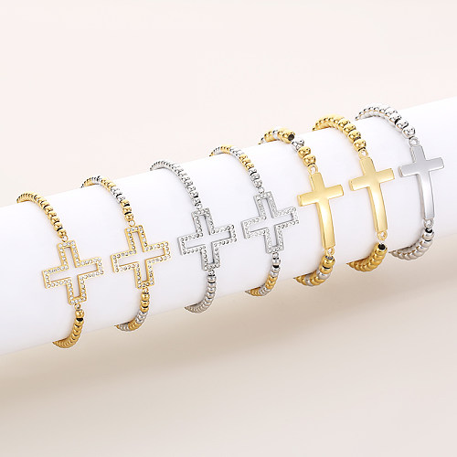 Bracelets plaqués or 18 carats avec incrustation de placage en acier titane croisé de style vintage