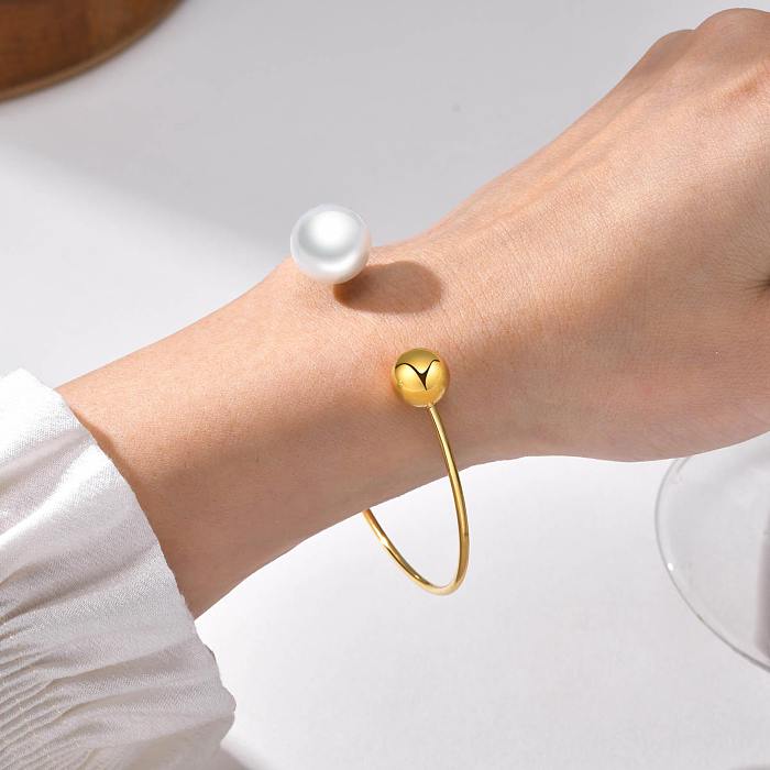 Bracelet rond en perles avec incrustation en acier inoxydable de style simple
