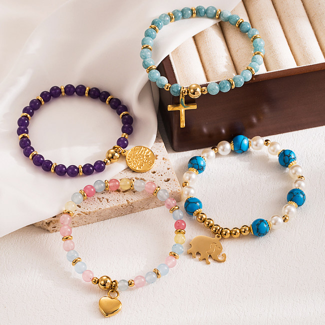 Pulseras chapadas en oro con cuentas sintéticas de perlas de imitación de acero inoxidable elefante en forma de corazón cruzado estilo INS