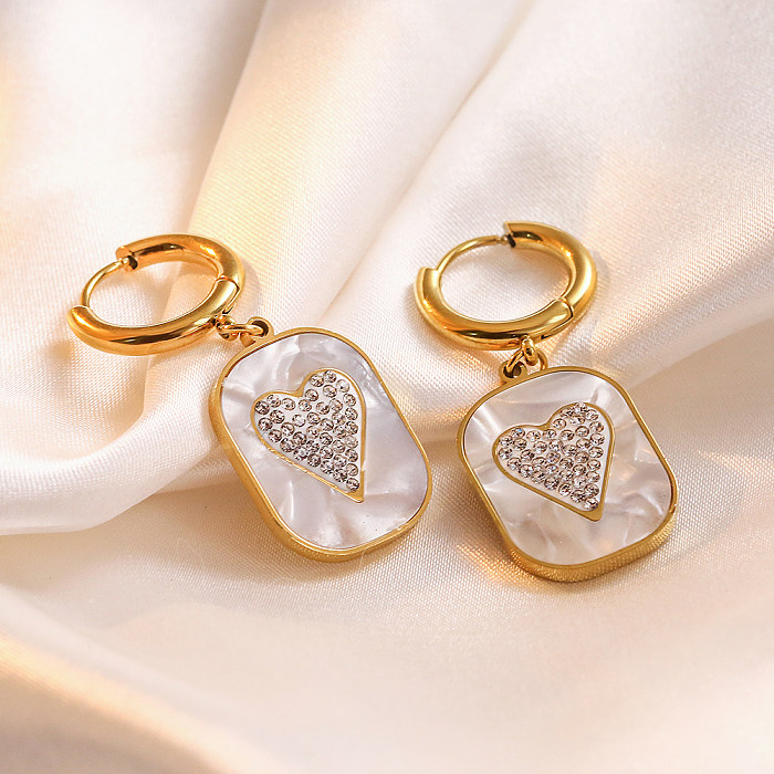 1 par de brincos de gota banhados a ouro 18K com zircônia de aço inoxidável brilhante em formato de coração