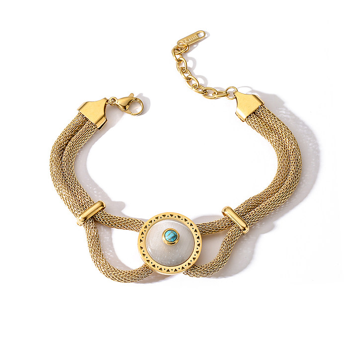 Bracelets plaqués or 18 carats en acier titanique d'oeil de forme de coeur artistique