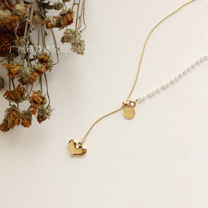 Collier coréen en acier inoxydable avec perles et pompon long en forme de cœur