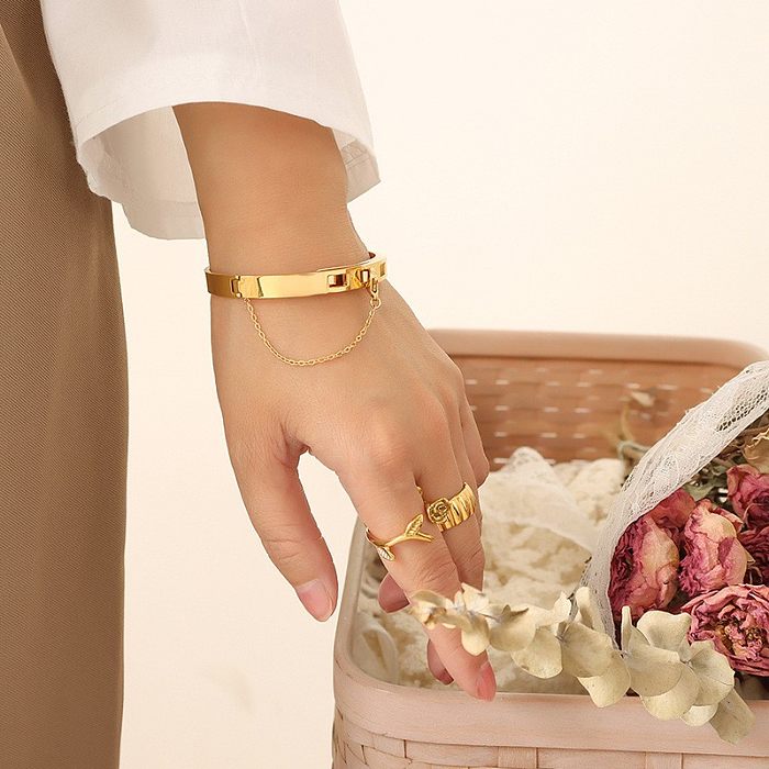 Jóias da moda corrente borla fivela aço titânio banhado a ouro 18k pulseira casal jóias de mão