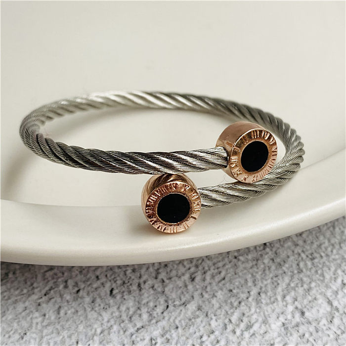 Bracelet de câble torsadé en acier inoxydable à rayures rondes de style classique