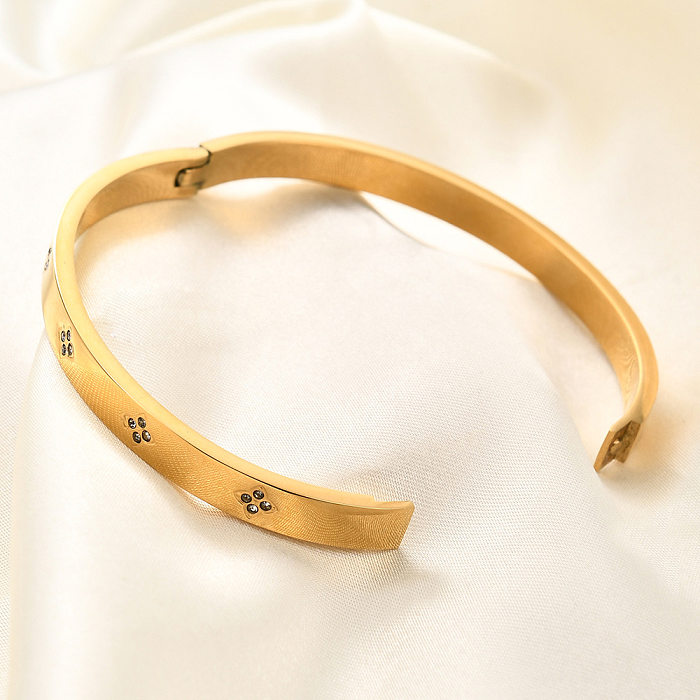 Atacado estilo simples cor sólida titânio chapeamento de aço incrustado pulseira de zircão banhado a ouro