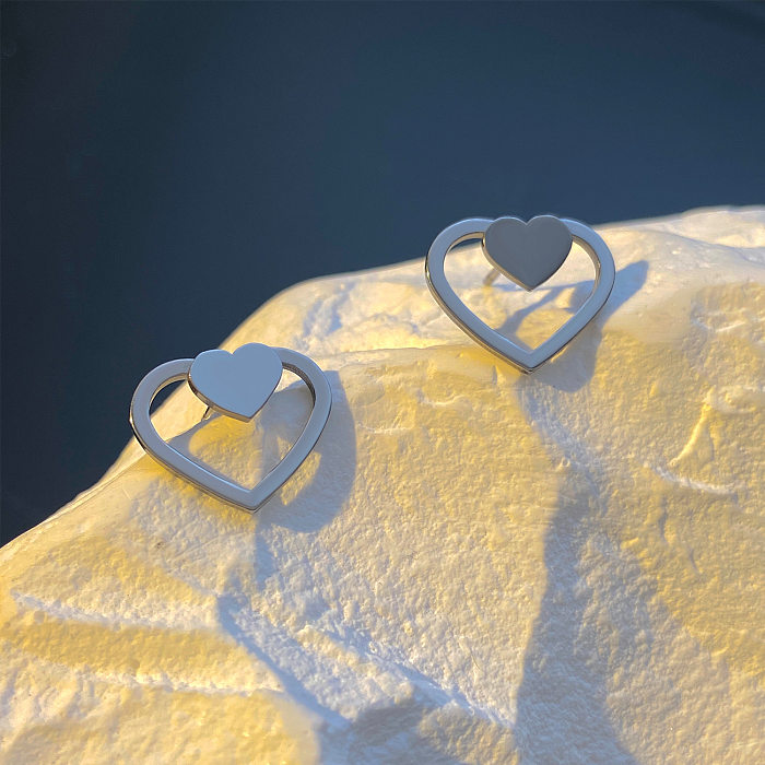 1 par de brincos de orelha de aço inoxidável em forma de coração geométrico estilo simples