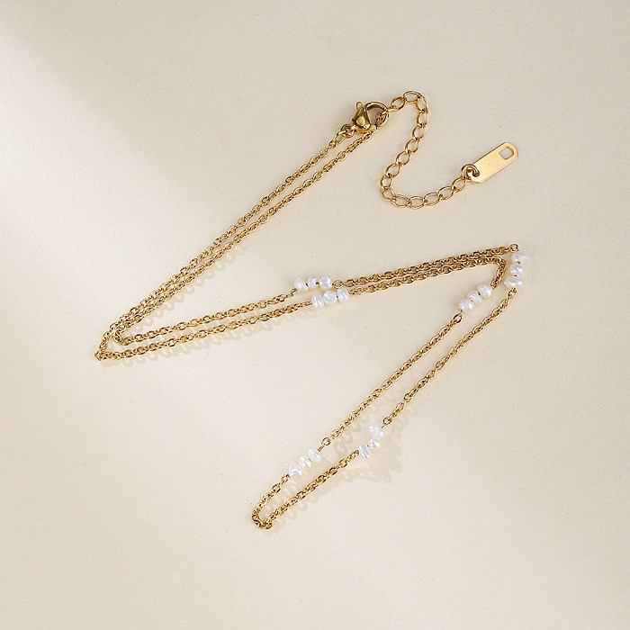 Elegante collar chapado en oro de 18 quilates con perlas de agua dulce de acero inoxidable y color sólido