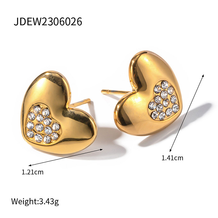 1 par de pendientes chapados en oro de 18 quilates con circonita de acero inoxidable chapado en forma de corazón de estilo Simple