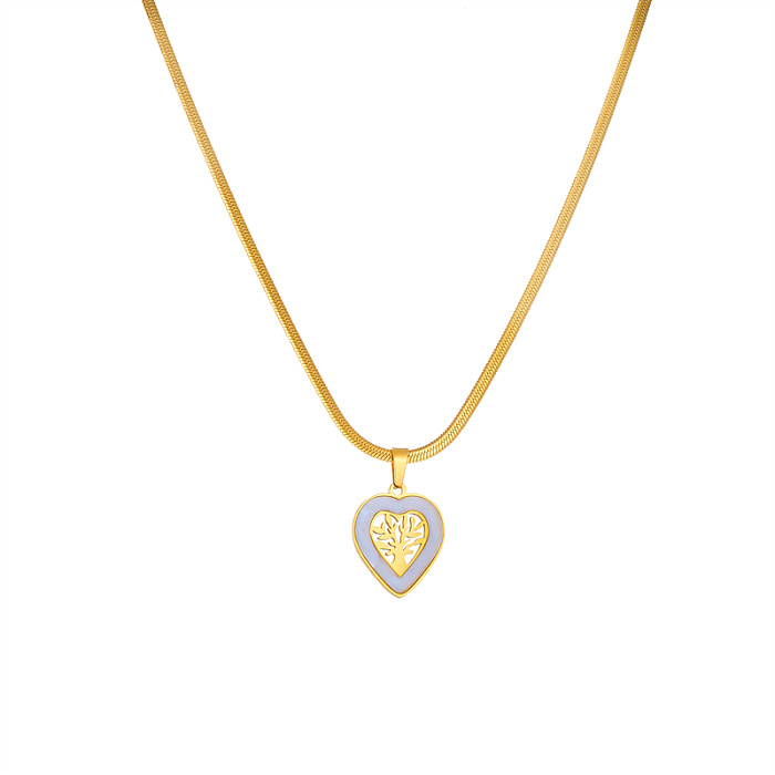 Collier pendentif élégant en forme de cœur d'arbre en acier inoxydable ajouré en Zircon plaqué or