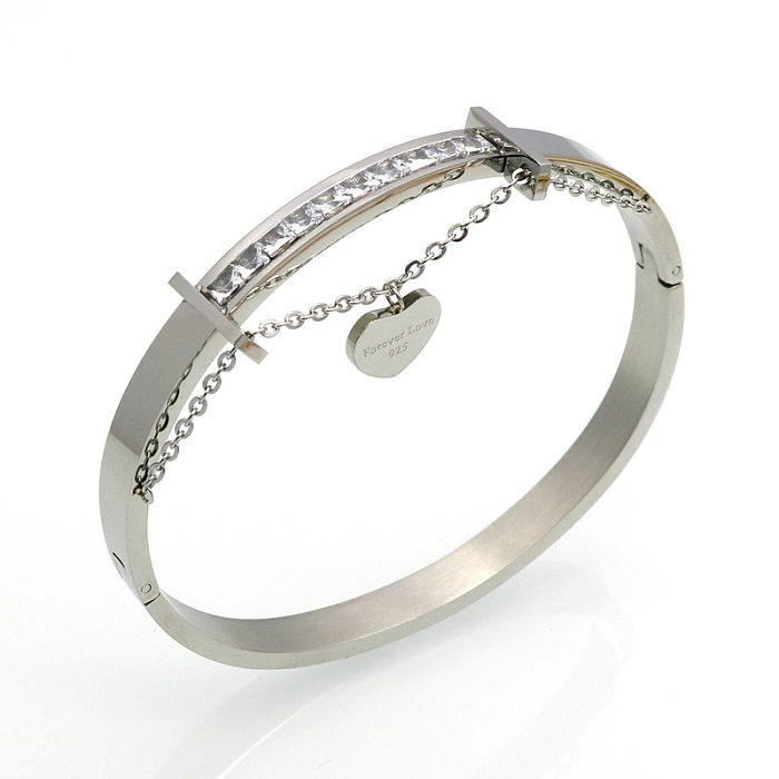 Brazalete de diamantes de imitación con incrustaciones de acero titanio en forma de corazón de moda