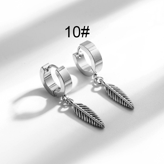 1 paire de boucles d'oreilles hip-hop géométriques en forme de croix et de plumes en acier inoxydable plaqué or 18 carats