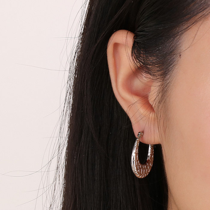 1 paire de boucles d'oreilles créoles plaquées or 18 carats en acier inoxydable plaqué ovale brillant