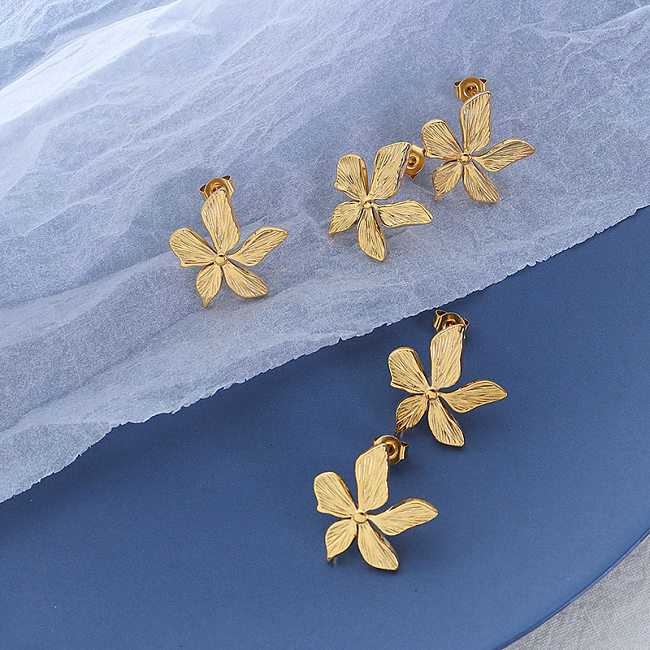 Modische, dreidimensionale, geprägte Retro-Ohrringe aus Edelstahl mit Blütenblatt