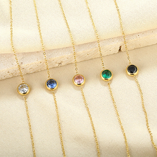 Einfache, glänzende, runde Armbänder mit Inlay aus Zirkon und 18 Karat vergoldetem Edelstahl