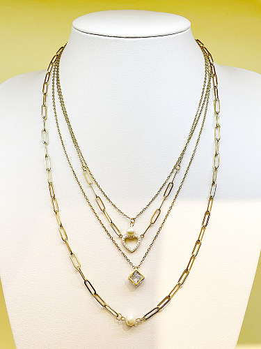 Elegante künstlerische Herzform-Rhombus-Edelstahl-Schichtüberzug-Inlay-Perlen-Zirkon-vergoldete mehrschichtige Halsketten