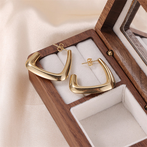 1 par de pinos de orelha banhados a ouro de aço inoxidável com revestimento geométrico de estilo simples