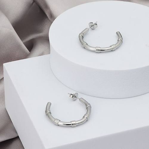 1 paire de clous d'oreilles en acier inoxydable, style moderne et décontracté, en forme de C