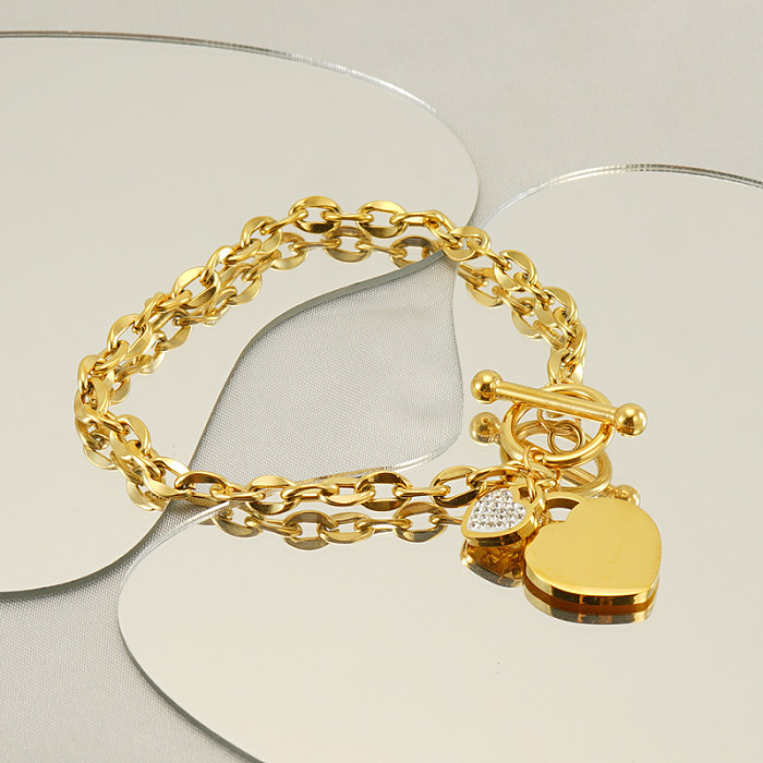 Süße herzförmige Edelstahl-Armbänder mit Toggle-Beschichtung und künstlichem Diamant, 18 Karat vergoldet