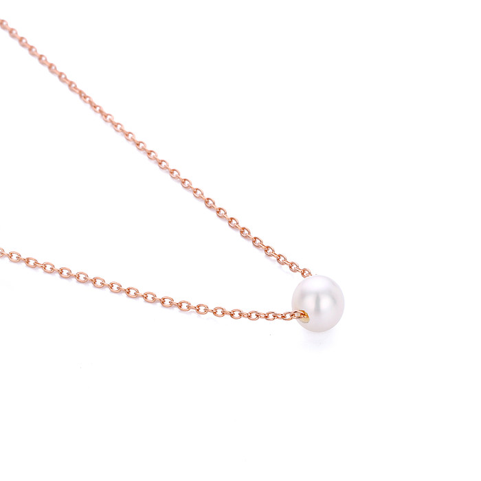 Einfache Halskette mit geometrischen Edelstahlbeschichtungen und künstlichen Perlen