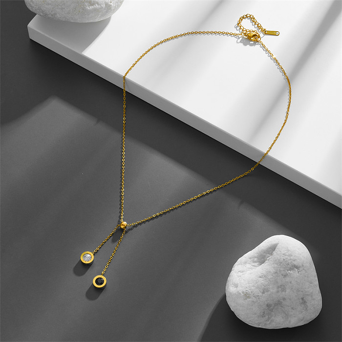 Einfacher, runder, vergoldeter Halskettenanhänger aus Edelstahl mit Quaste und Zirkon