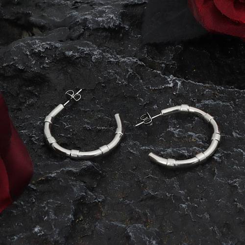 1 par de brincos de orelha de aço inoxidável estilo moderno casual em forma de C
