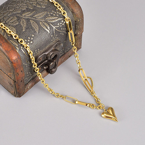 Collier pendentif plaqué or en acier inoxydable en forme de cœur élégant