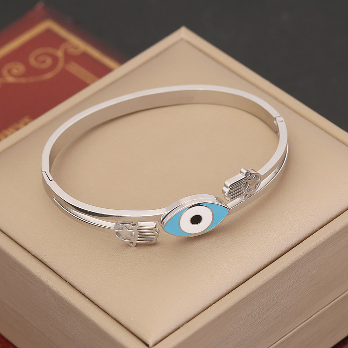 Bracelet en diamant artificiel avec incrustation de placage en acier inoxydable en forme de coeur d'oeil du diable de Style Simple