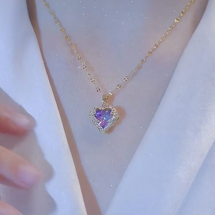 Collier élégant avec pendentif en diamant artificiel, en acier inoxydable, en forme de cœur, avec incrustation de cuivre