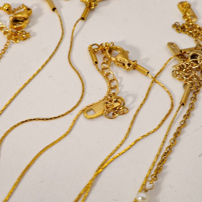 Collar chapado en oro de 18 quilates con revestimiento de perlas de imitación de acero inoxidable con gotas de agua estilo IG