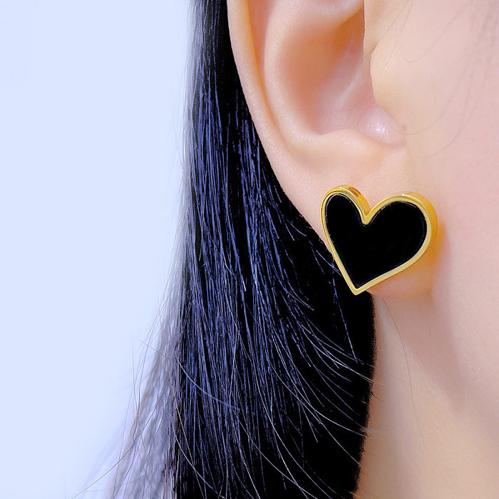 Clous d'oreilles plaqués en acier inoxydable en forme de cœur, 1 paire
