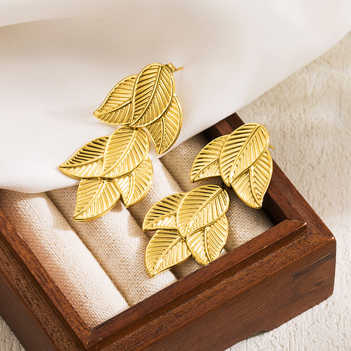 1 par de brincos estilo IG folhas gotas de água formato de coração aço inoxidável banhado a ouro