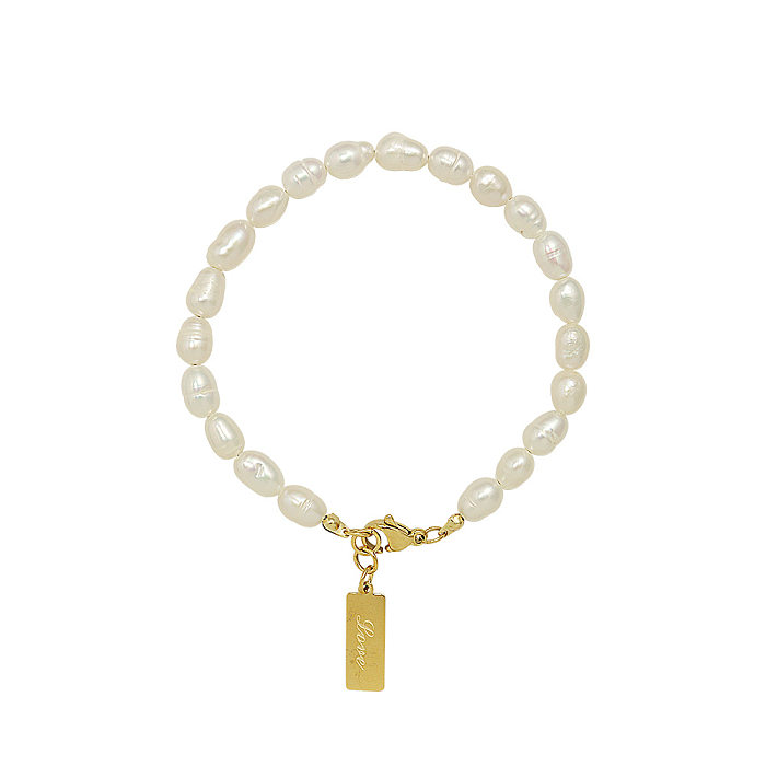 Bracelet de perles d'eau douce plaqué or 18 carats, titane et acier, tempérament à la mode, vente en gros