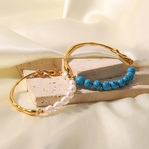 Luxueux bracelets géométriques en acier inoxydable plaqué or avec perles turquoise