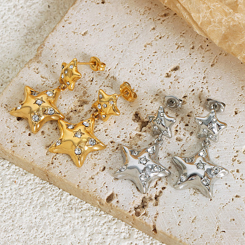 1 par de lujosos pendientes chapados en oro de 18 quilates con incrustaciones de pentagrama y diamantes de imitación de acero inoxidable