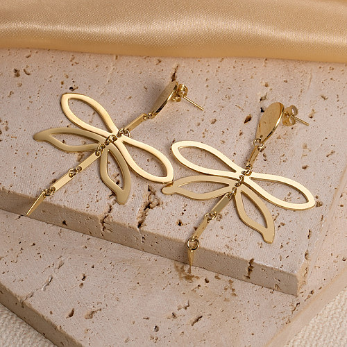 1 par de elegantes pendientes colgantes chapados en oro de acero inoxidable con diseño de libélula de estilo moderno para vacaciones