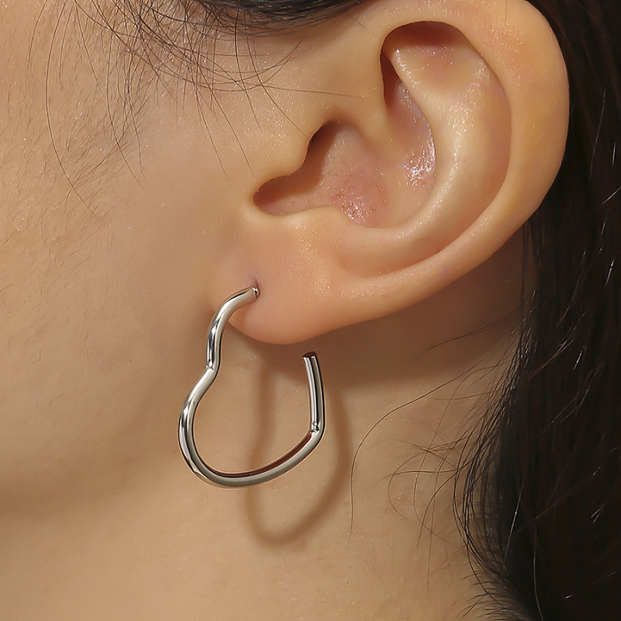 1 paire de boucles d'oreilles polies en acier inoxydable, jolies et romantiques en forme de cœur