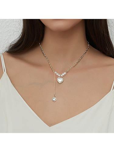 Collier avec pendentif plaqué or 18 carats, style simple et élégant, en forme de cœur, en acier inoxydable, avec incrustation de perles