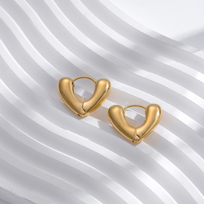 Pendientes de aro chapados en oro de 18 quilates con incrustaciones de acero inoxidable redondos en forma de V de estilo simple de estilo moderno