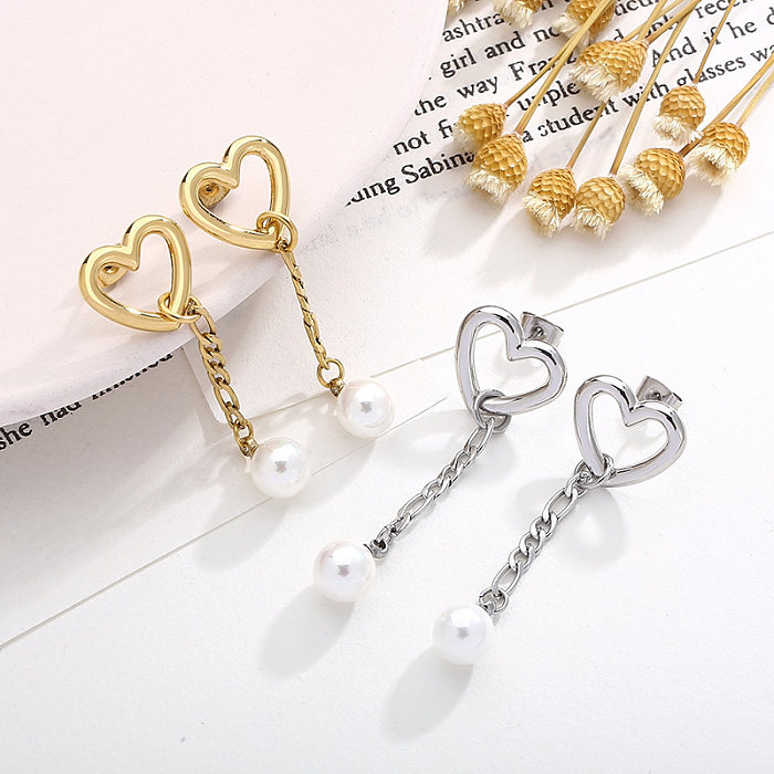 1 par de pendientes colgantes chapados en perlas de acero inoxidable con forma de corazón, ropa de calle de estilo moderno