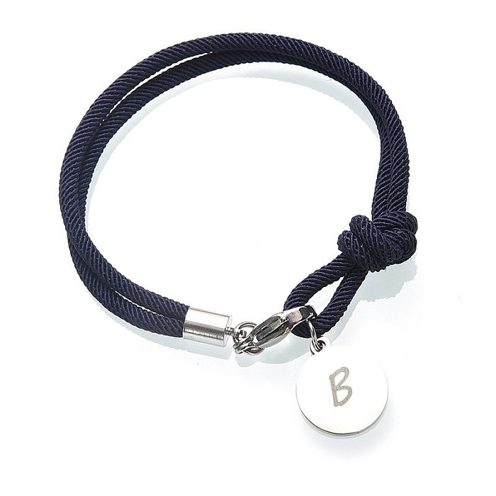 Bracelets plaqués argent de placage de tricot d'acier inoxydable de lettre de trajet de style simple