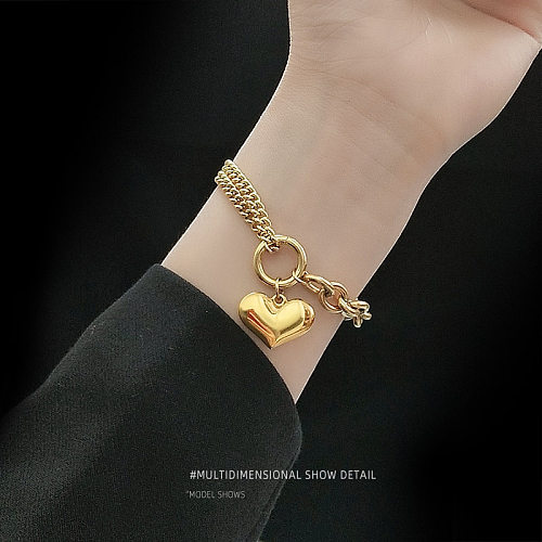Schweres, raues, flaches, liebesförmiges Wildherz-Armband aus Titanstahl mit 18-Karat-Goldbeschichtung für Damen