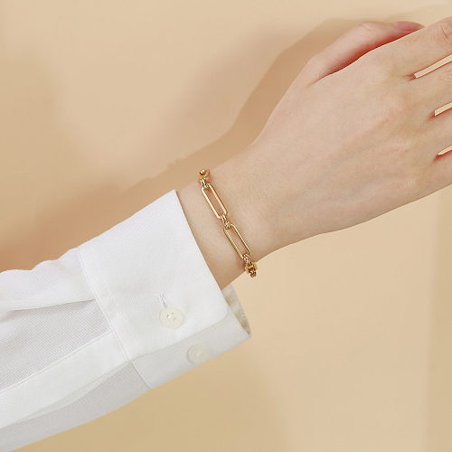 Bracelets en acier inoxydable de couleur unie de style simple plaquant des bracelets en acier inoxydable
