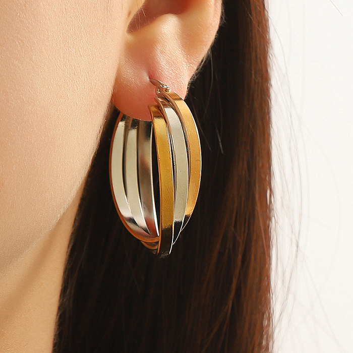 1 Paar schlichte, kunstvolle, runde, polierte Edelstahl-Ohrringe mit 18-Karat-Vergoldung