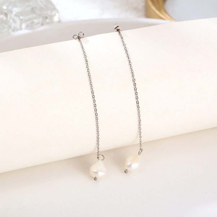 1 par de líneas de oreja de acero inoxidable con perlas de impresión de estilo simple