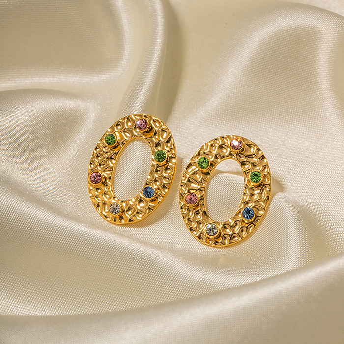 1 par de elegantes pendientes ovalados chapados en acero inoxidable con incrustaciones huecas de diamantes artificiales chapados en oro de 18 quilates