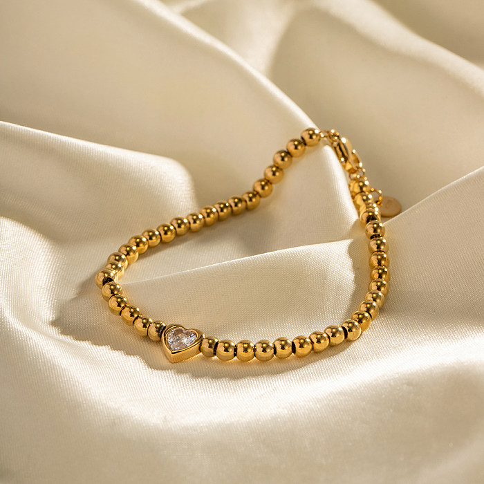 Bracelets plaqués or de Zircon d'incrustation de placage d'acier inoxydable de forme de coeur élégante