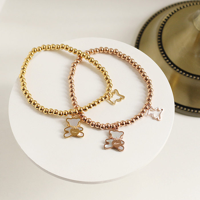 Bracelet élastique en acier au titane avec perles rétro et coquillages d'ours