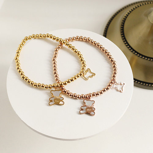 Bracelet élastique en acier au titane avec perles rétro et coquillages d'ours